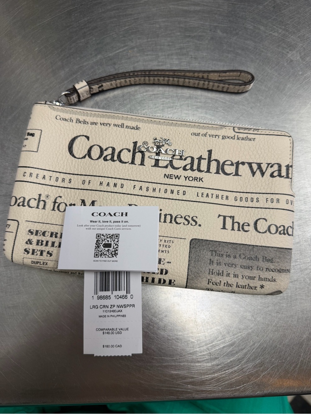 Coach Newspaper Print Wristlet in Cream and Black